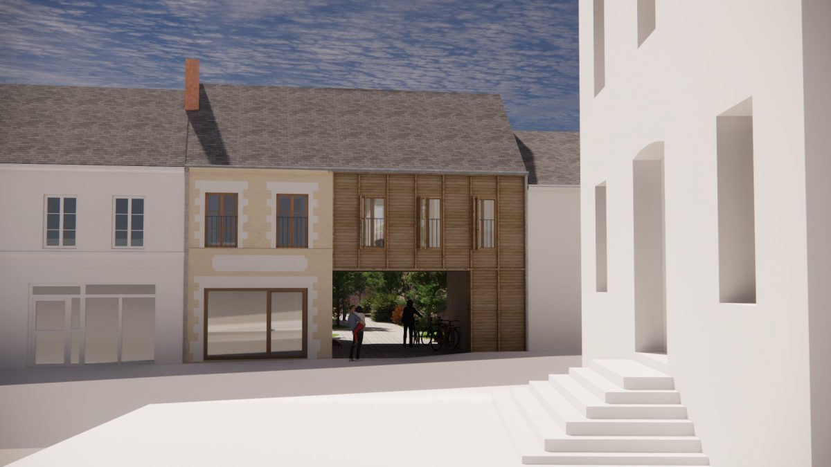 Extension contemporaine en bois avec grandes baies vitrées, intégrée à une maison traditionnelle en pierre, cour pavée